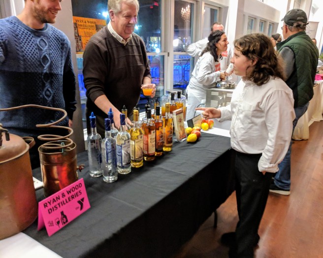 Taste of Cape Ann YMCA Ryan and Wood teens help out Cameron checking if they need anything 20171109_182526